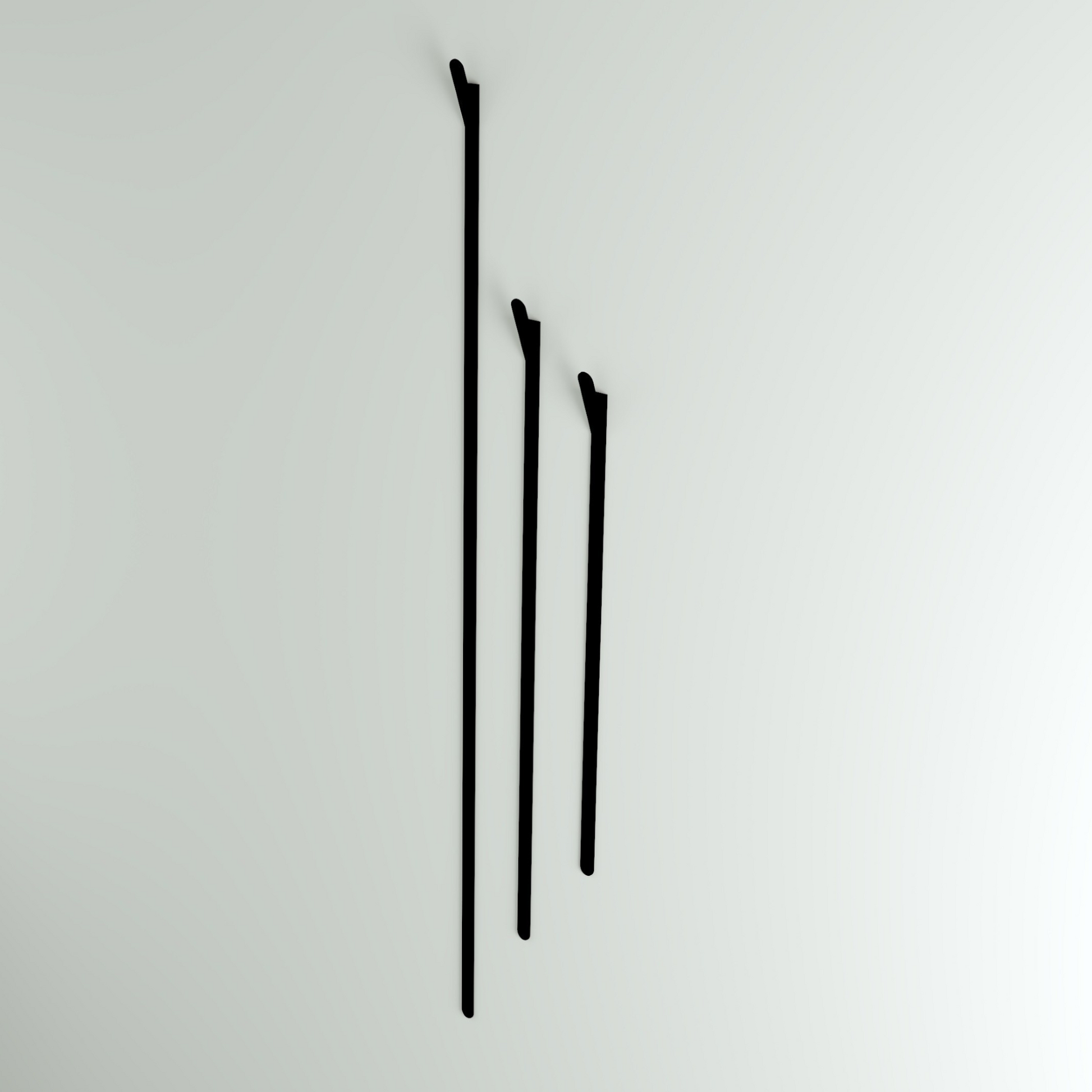 Crafted from bent steel with a durable finish, the Slatted Wall Hook adds a striking, minimalist accent while keeping essentials neatly organized.